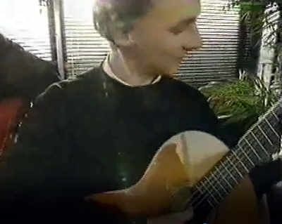 Paul Cooijmans playing guitar in Television nomads bus